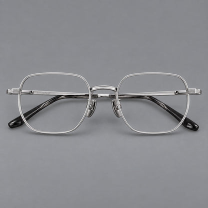 Retro square titanium glasses with rounded rims and finely grooved shoulders in Silver, front view temple detail