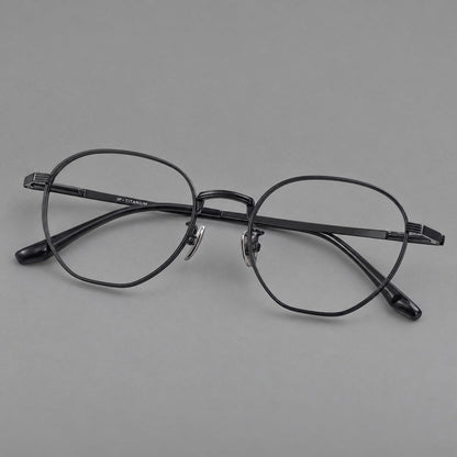 Retro panto titanium glasses with a curved bridge and fine parallel rim grooves in Black, three quarter view