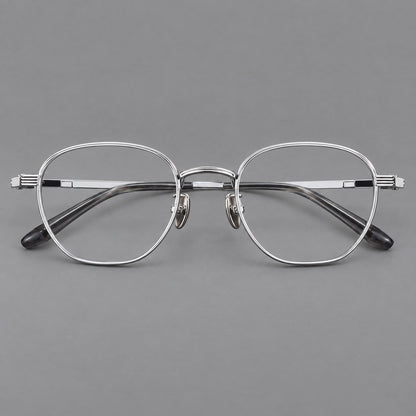 Retro panto titanium glasses with a curved bridge and fine parallel rim grooves in Black and Silver, front view frame detail