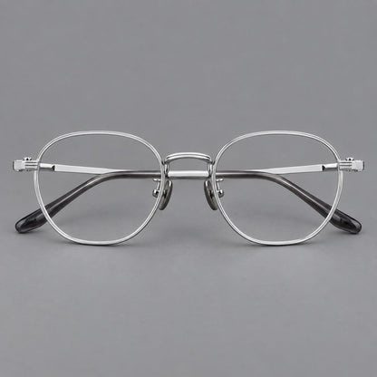 Retro panto titanium glasses with a curved bridge and fine parallel rim grooves in Silver, front view temple detail