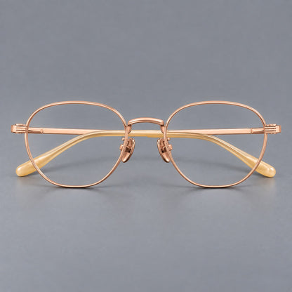 Retro panto titanium glasses with a curved bridge and fine parallel rim grooves in Rose Gold, front view additional product view