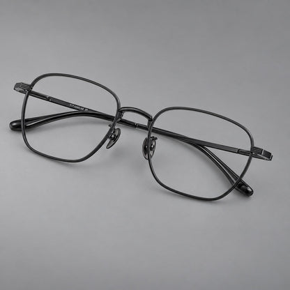 Deep square titanium glasses with a flatter brow and grooved outer shoulders in Black, three quarter view