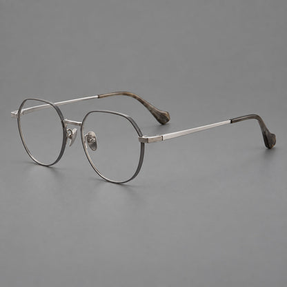 Geometric titanium glasses with soft polygonal rims and fine shoulder detailing in Gray and Silver, three quarter view additional product view