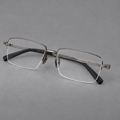 Classic half frame titanium glasses with rectangular lenses and lined temples in Gunmetal, three quarter view front view