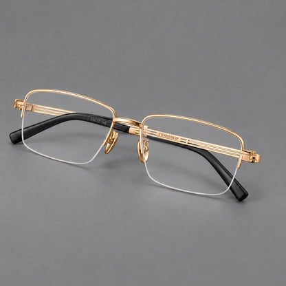 Classic half frame titanium glasses with rectangular lenses and lined temples in Gold, three quarter view lens detail