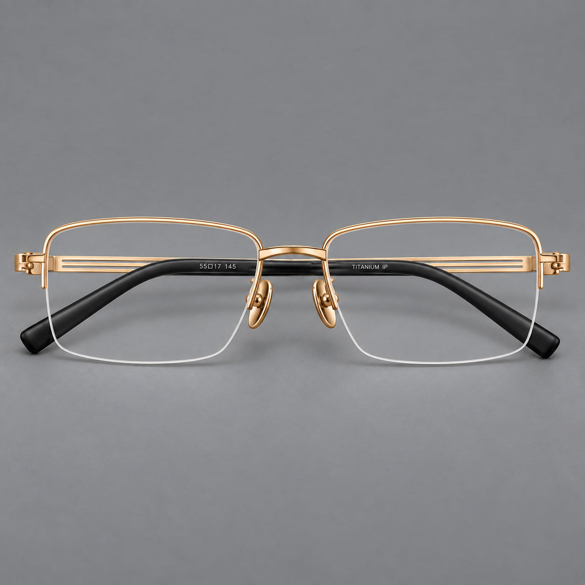 Classic half frame titanium glasses with rectangular lenses and lined temples in Gold, front view
