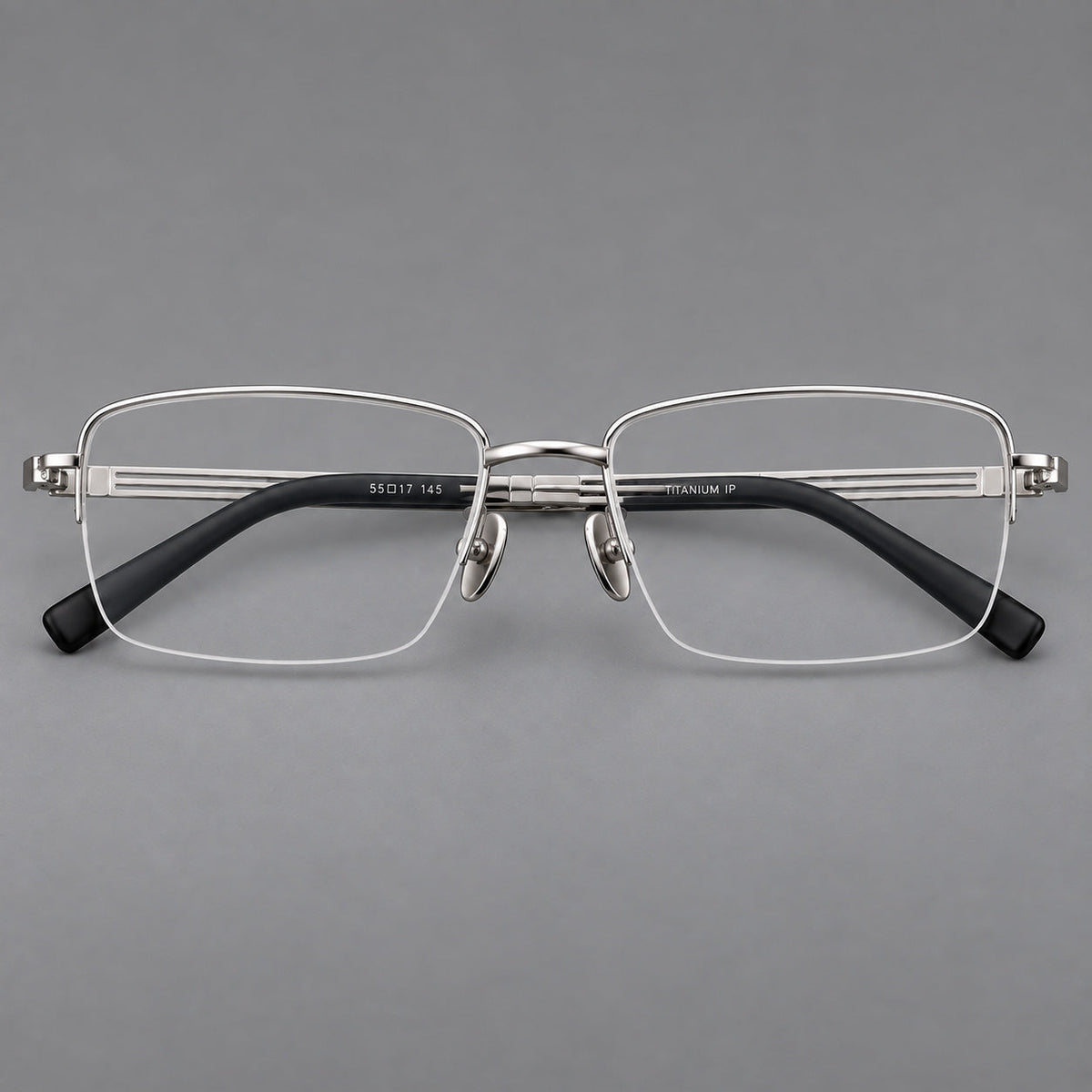 Classic half frame titanium glasses with rectangular lenses and lined temples in Silver, front view