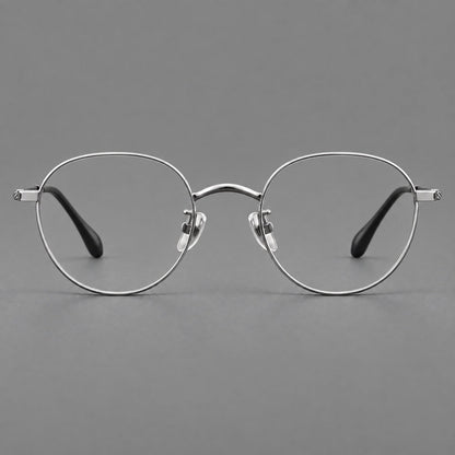 Compact round titanium glasses with an arched bridge and textured temple accents in Silver, front view additional product view