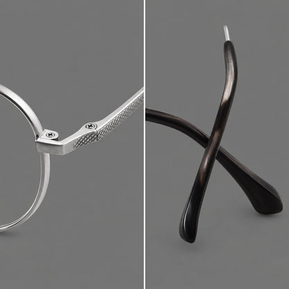 Compact round titanium glasses with an arched bridge and textured temple accents, frame details additional product view