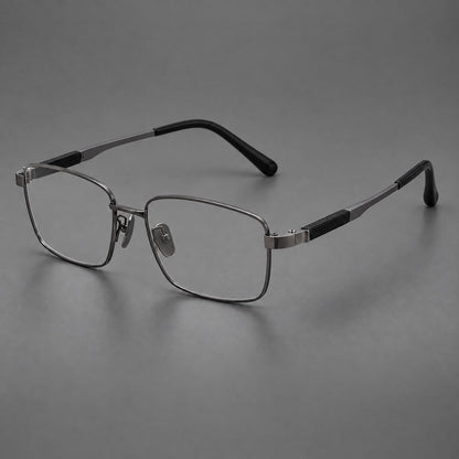 Slim rectangular titanium glasses with broad temples and contrasting dark inserts in Gunmetal, three quarter view front view