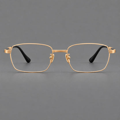 Slim rectangular titanium glasses with broad temples and contrasting dark inserts in Gold, front view temple detail