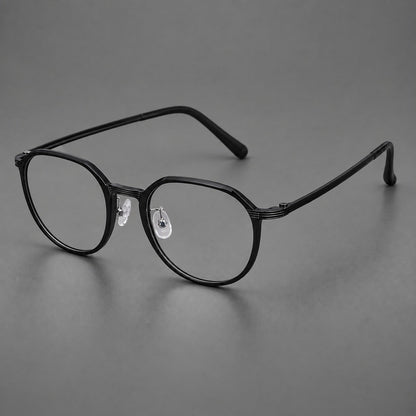Geometric titanium glasses with flattened corners and a finely ridged bridge in Black, three quarter view