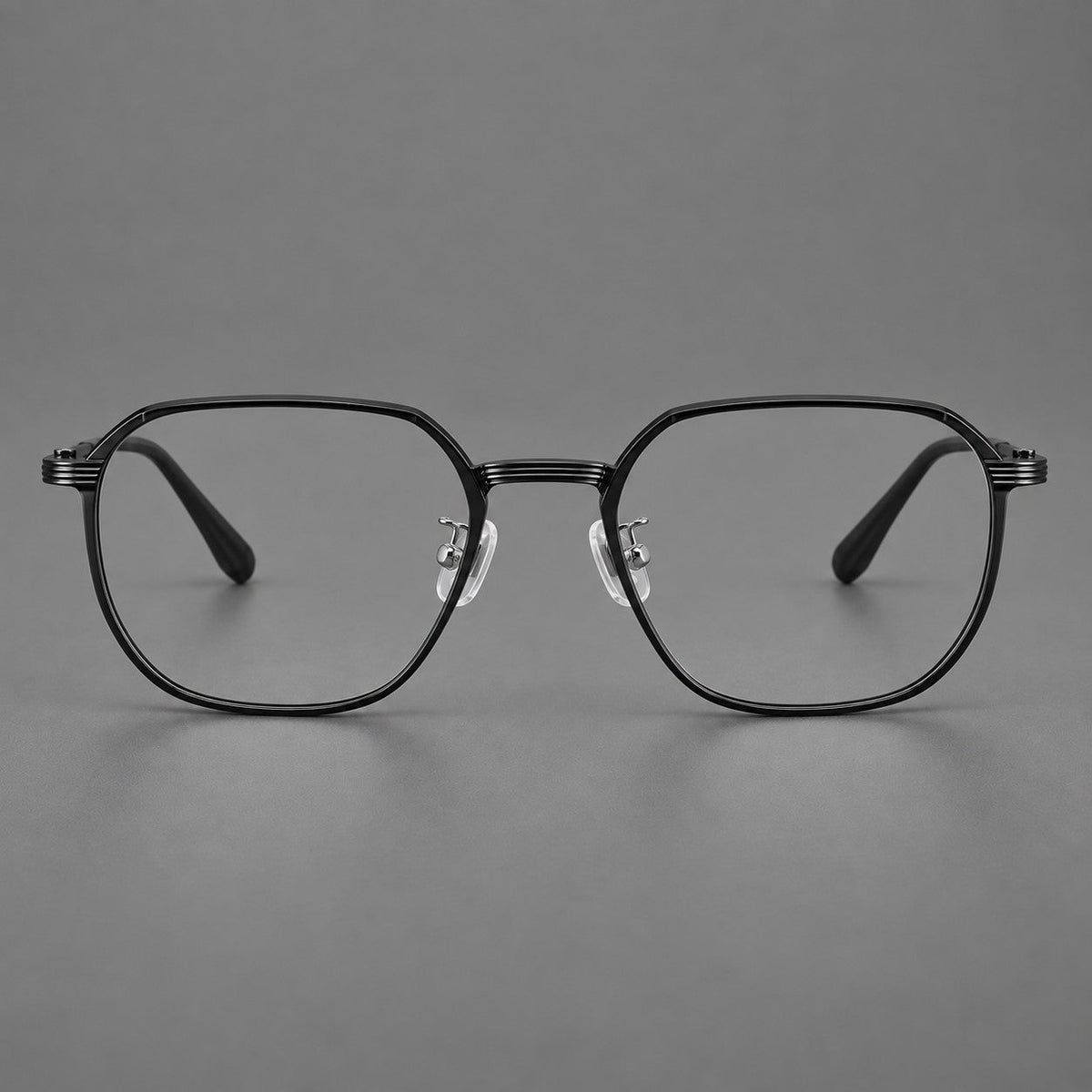 Geometric titanium glasses with flattened corners and a finely ridged bridge in Black, front view