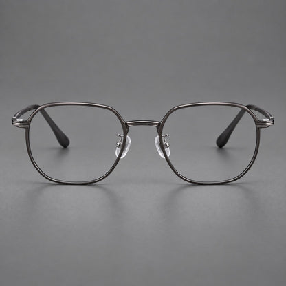 Geometric titanium glasses with flattened corners and a finely ridged bridge in Dark Gray, front view frame detail