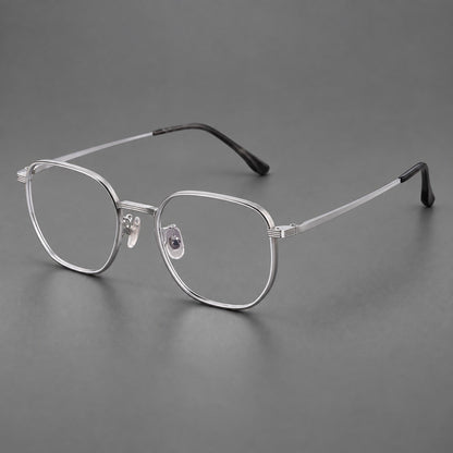 Geometric titanium glasses with flattened corners and a finely ridged bridge in Silver, three quarter view additional product view