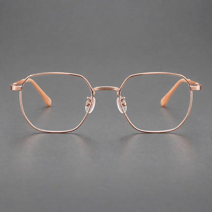 Geometric titanium glasses with flattened corners and a finely ridged bridge in Rose Gold, front view additional product view