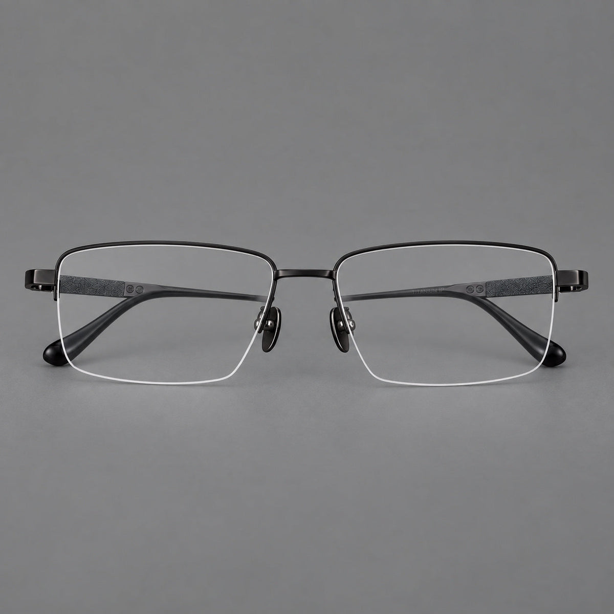 Wide half frame titanium glasses with rectangular lenses and textured temples in Black, front view