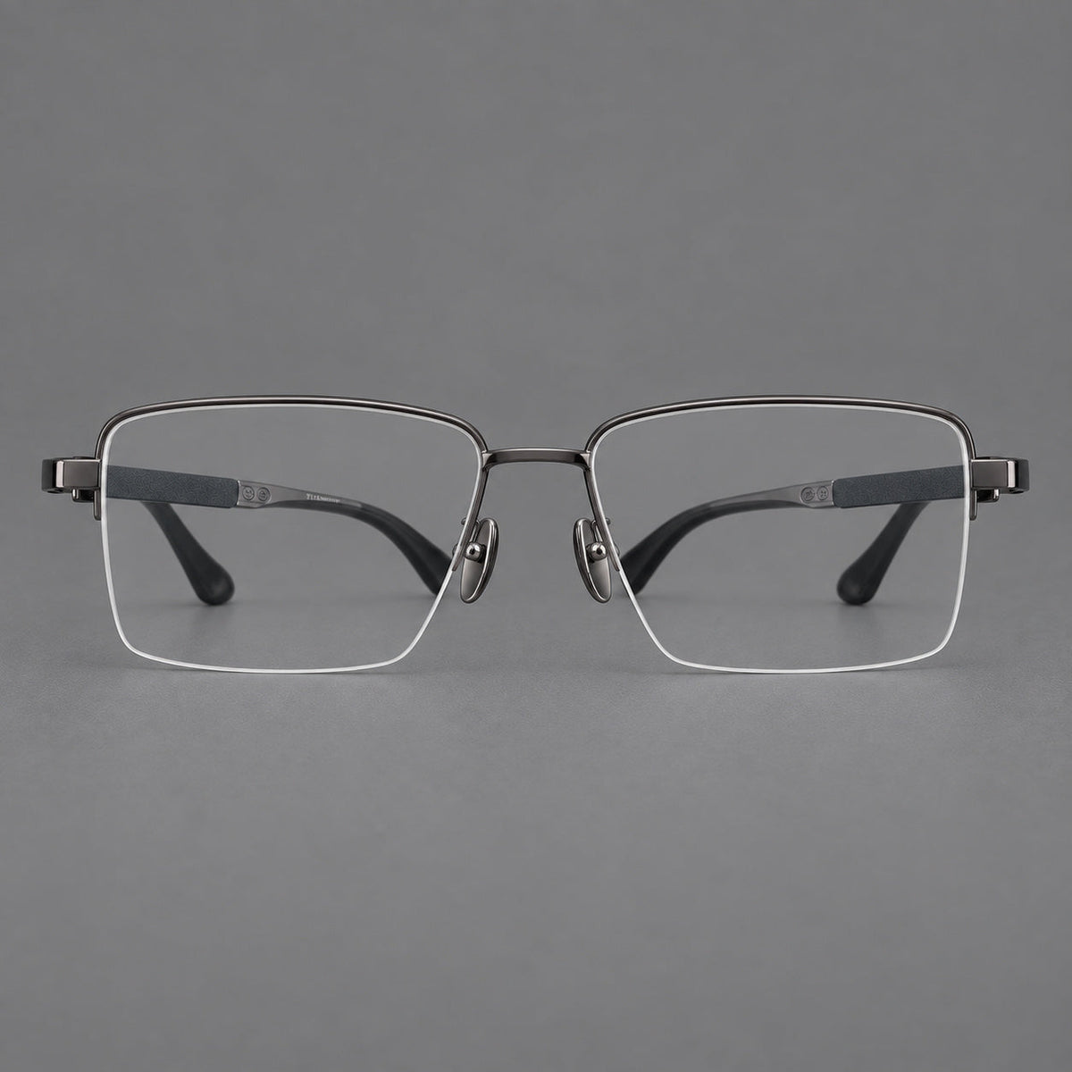 Wide half frame titanium glasses with rectangular lenses and textured temples in Gunmetal, front view