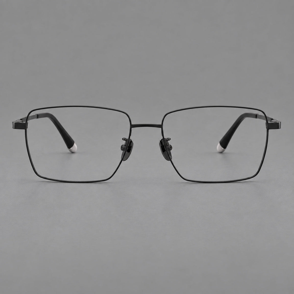 Clean rectangular titanium glasses with inset temple details and pale end accents in Black, front view