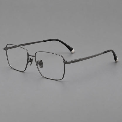 Clean rectangular titanium glasses with inset temple details and pale end accents in Gunmetal, three quarter view front view