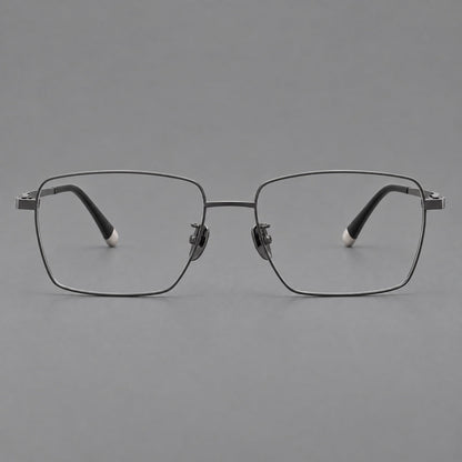 Clean rectangular titanium glasses with inset temple details and pale end accents in Gunmetal, front view frame detail