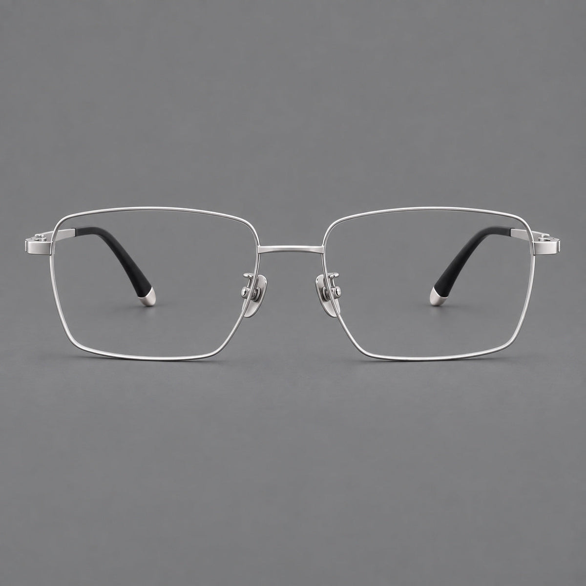 Clean rectangular titanium glasses with inset temple details and pale end accents in Silver, front view