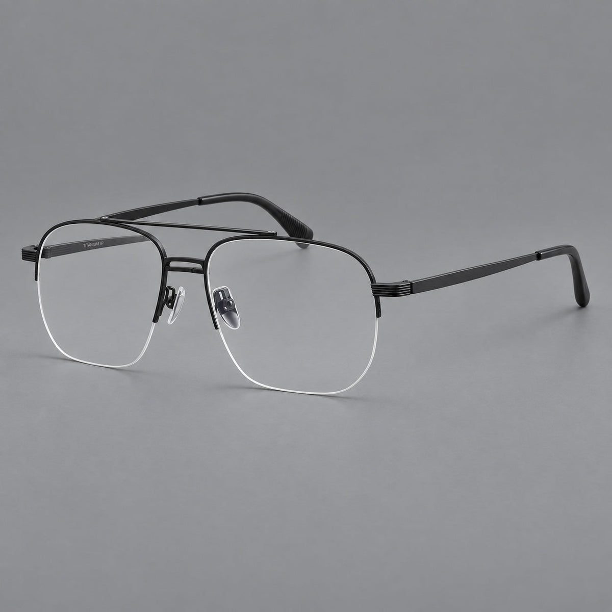 Angular aviator titanium glasses with a double bridge and an open lower rim in Matte Black, three quarter view