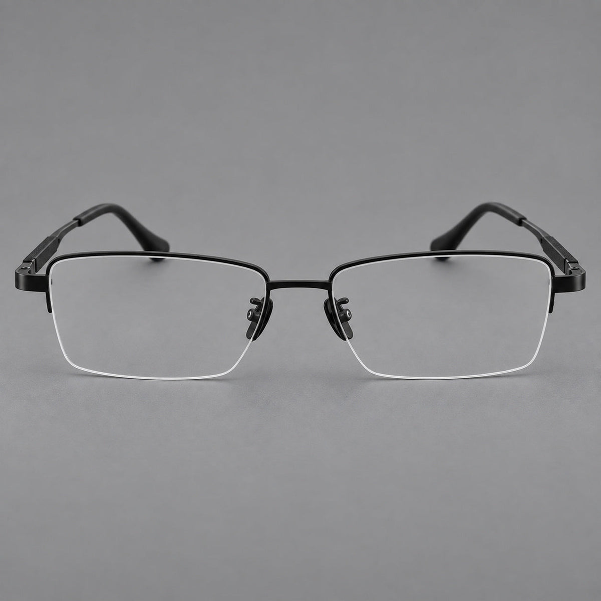 Modern half frame titanium glasses with a narrow bridge and dark temple sections in Black, front view