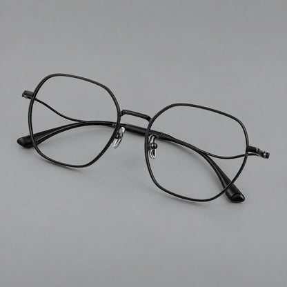 Geometric titanium glasses with engraved rim edges and curved temple joins in Black, three quarter view