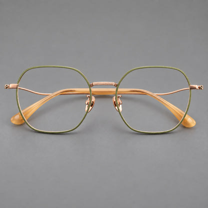 Geometric titanium glasses with engraved rim edges and curved temple joins in Green and Rose Gold, front view temple detail