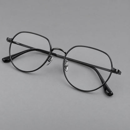 Classic panto titanium glasses with a curved bridge and slim straight temples in Black, three quarter view