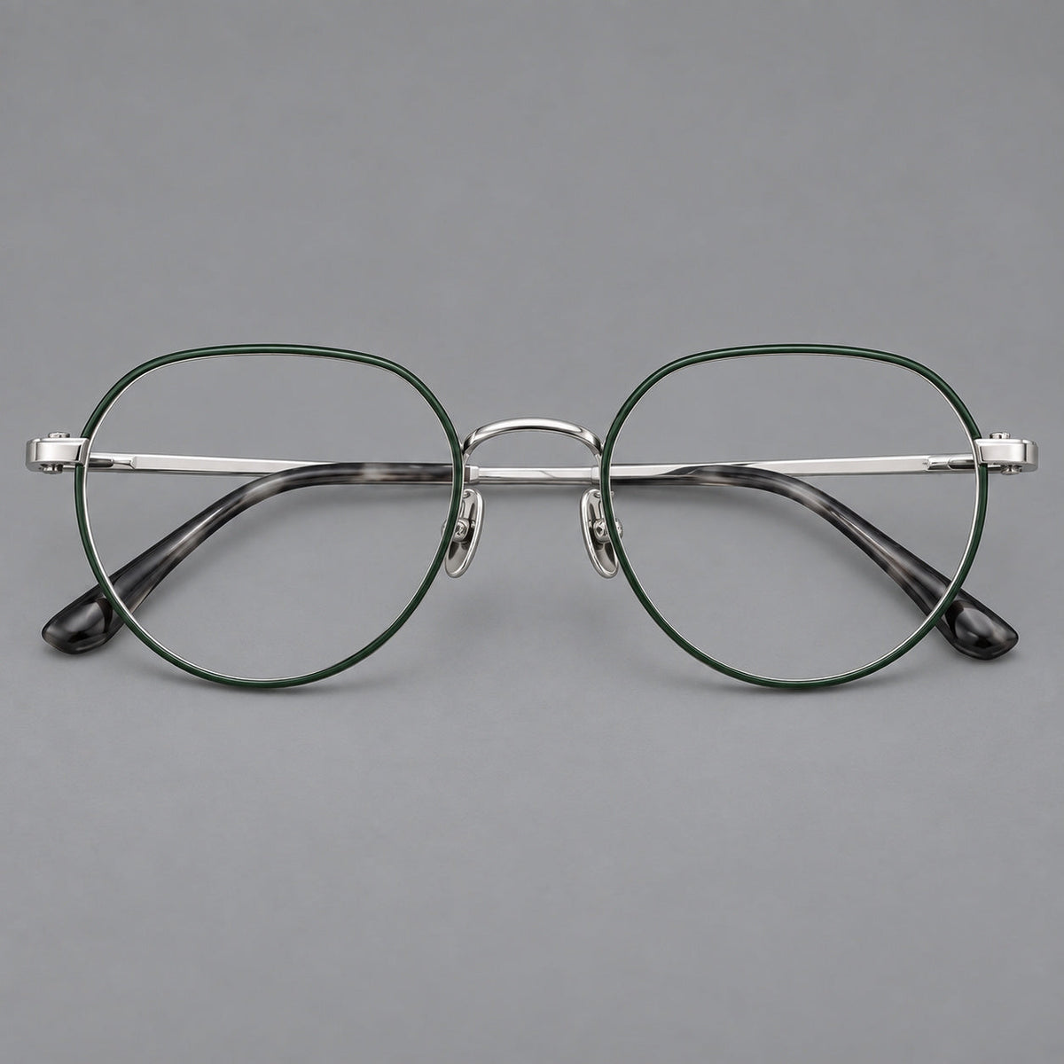 Classic panto titanium glasses with a curved bridge and slim straight temples in Dark Green and Silver, front view