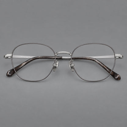 Retro panto titanium glasses with stepped corners and finely engraved temples in Gray and Silver, front view temple detail