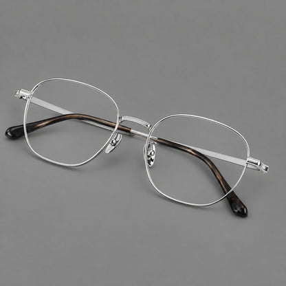 Retro panto titanium glasses with stepped corners and finely engraved temples in Silver, three quarter view additional product view