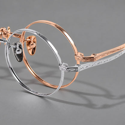 Compact circular titanium glasses with a curved bridge and wavy engraved temples, frame details additional product view