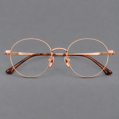 Classic circular titanium glasses with a raised bridge and lined temple accents in Rose Gold, front view additional product view