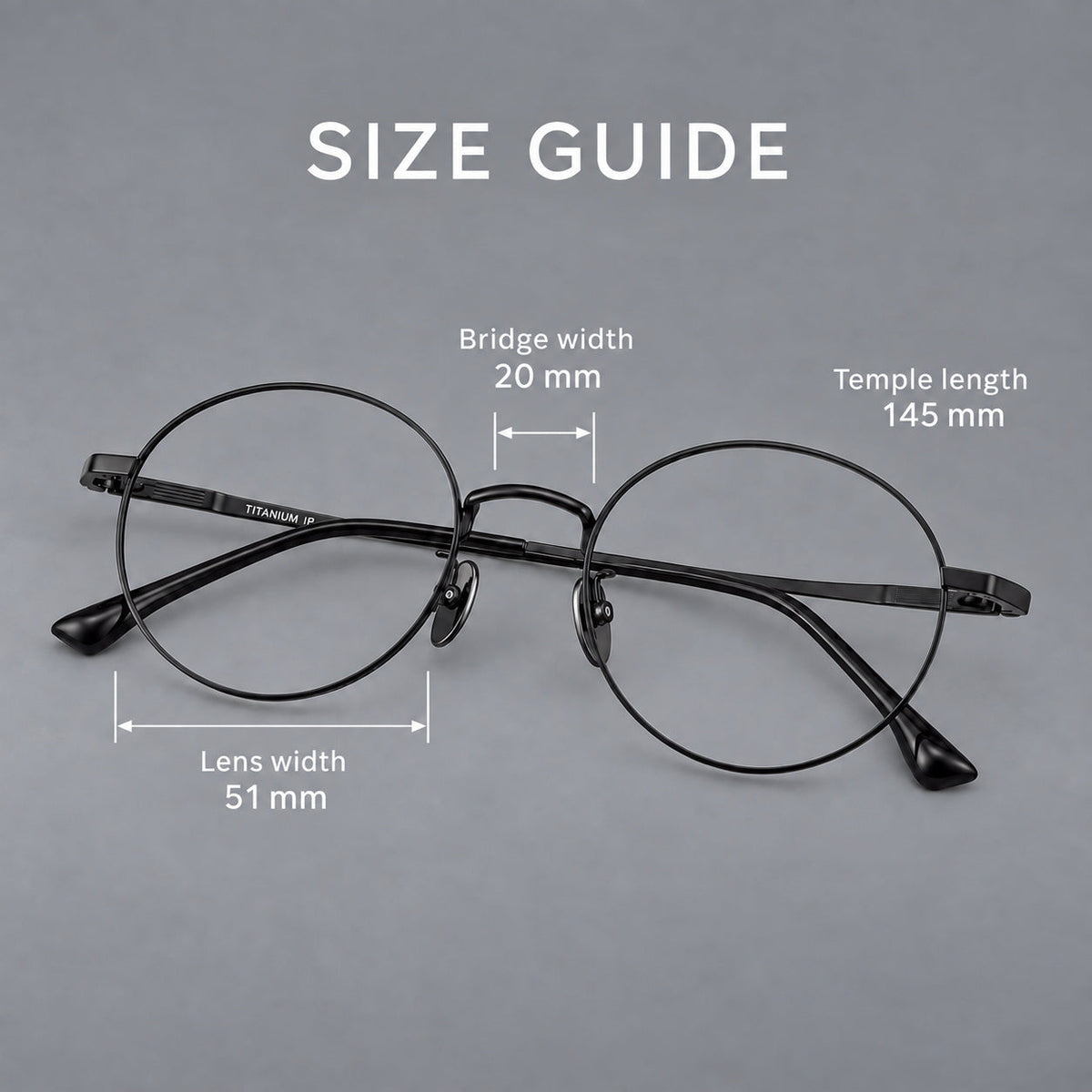 Classic circular titanium glasses with a raised bridge and lined temple accents, size guide in millimetres