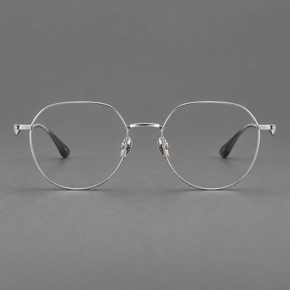 Rounded titanium glasses with a short bridge and distinctive wavy metal temples in Silver, front view additional product view