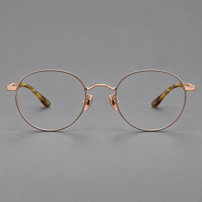 Retro panto titanium glasses with faceted corners and mottled curved temple tips in Gray Brown and Rose Gold, front view frame detail