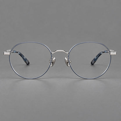 Retro panto titanium glasses with faceted corners and mottled curved temple tips in Gray Blue and Silver, front view temple detail