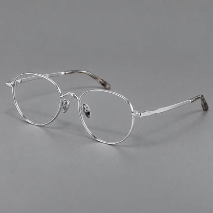 Retro panto titanium glasses with faceted corners and mottled curved temple tips in Silver, three quarter view additional product view