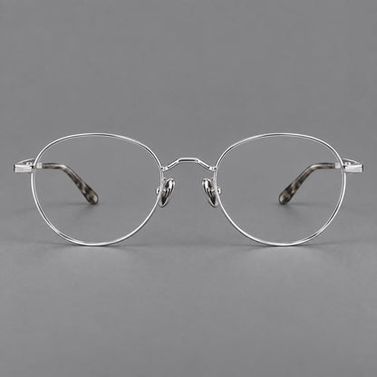 Retro panto titanium glasses with faceted corners and mottled curved temple tips in Silver, front view additional product view