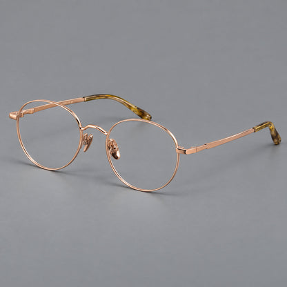 Retro panto titanium glasses with faceted corners and mottled curved temple tips in Rose Gold, three quarter view additional product view