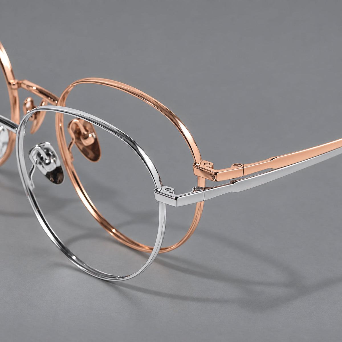 Retro panto titanium glasses with faceted corners and mottled curved temple tips, frame details