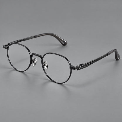 Small panto titanium glasses with an angular bridge and recessed temple details in Black, three quarter view