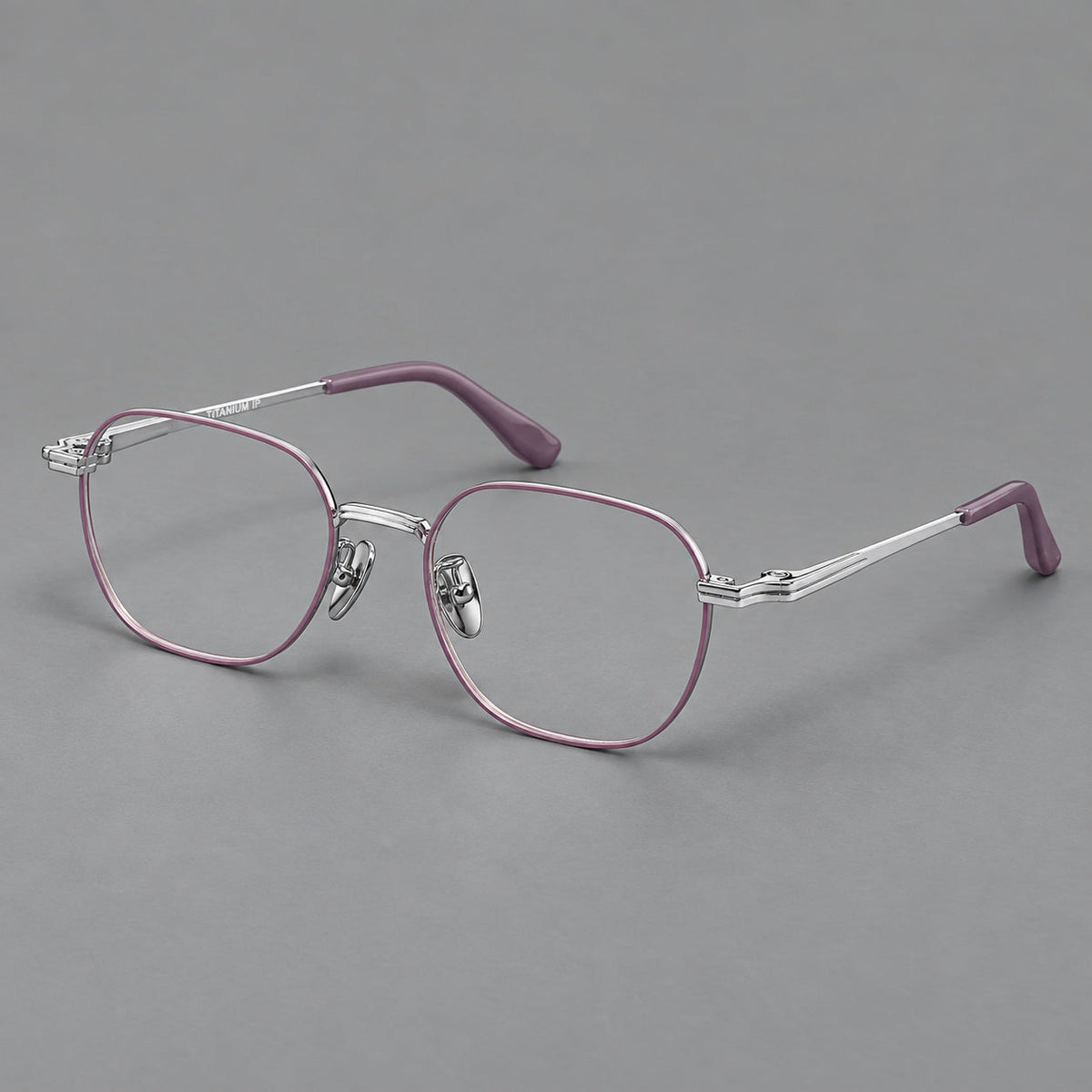 Soft square titanium glasses with an angular bridge and layered corner details in Purple and Silver, three quarter view