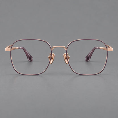 Soft square titanium glasses with a raised bridge and engraved temple bands in Purple and Rose Gold, front view frame detail