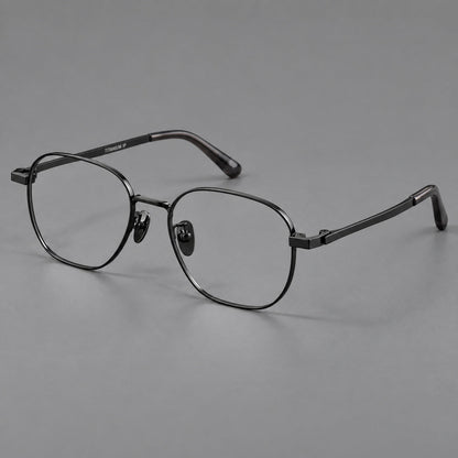 Rounded panto titanium glasses with an angular bridge and broad flat temples in Black, three quarter view