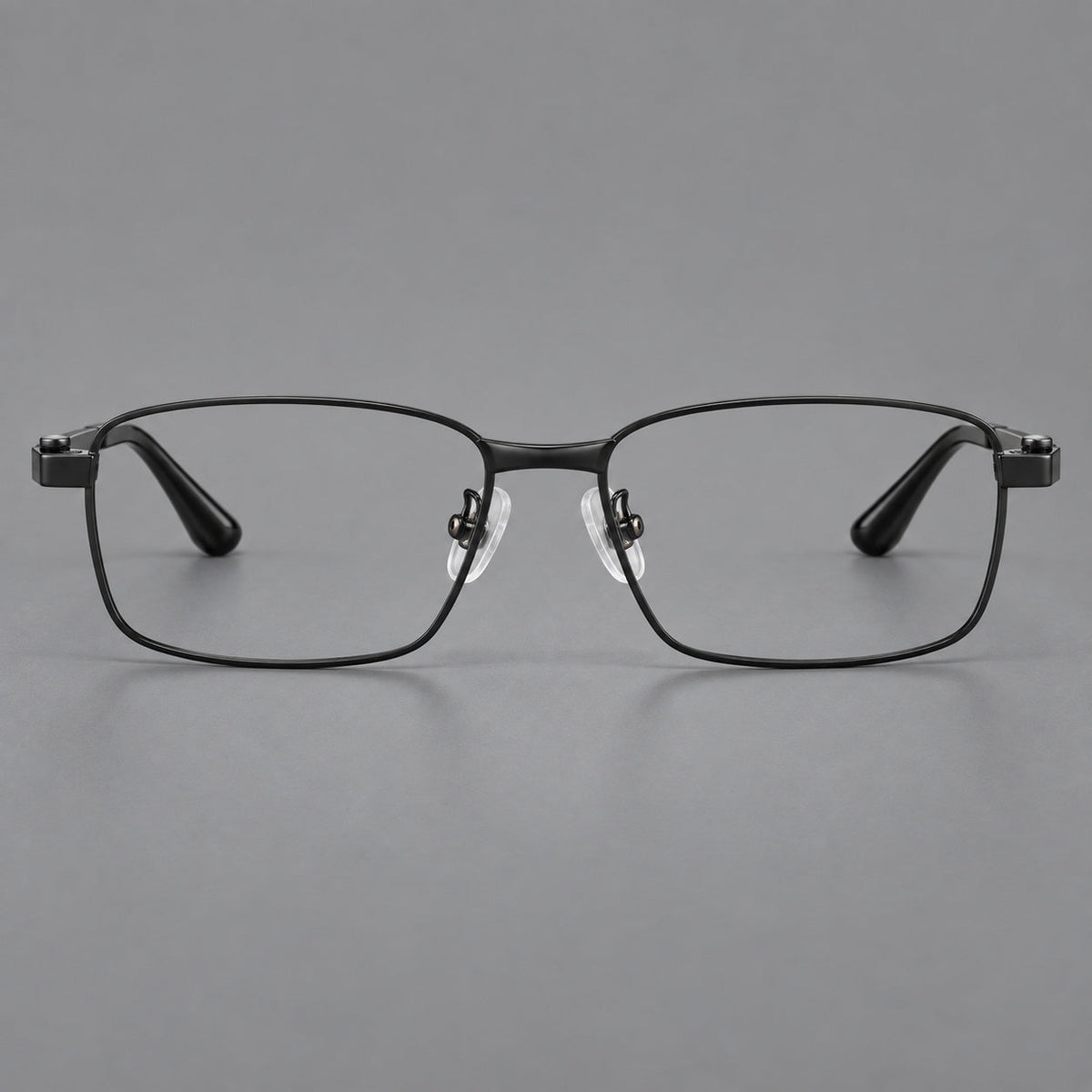Wide rectangular titanium glasses with a broad bridge and rounded hinge caps in Black, front view
