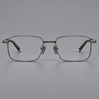 Rectangular titanium glasses with inset corner lines and metal capped temple tips in Gunmetal, front view frame detail
